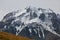 Rocky slope of mountain peaks, glaciers, snowfields