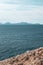 Rocky steep cliff blue Ionian seascape, Lefkada