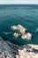 Rocky steep cliff look down, blue Ionian seascape