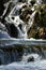 Rocky waterfall on river