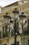 Rod iron street lamps of Avila Spain, an old Castilian Spanish village