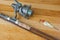 Rod with lure on wood desk