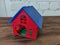 Rodent house on dark wooden background