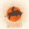 Rodeo bull symbol vector. Cowboy riding a wild bull in vintage style illustration and rodeo text