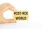 Roe vs Wade post-Roe world symbol. Concept words Post-Roe world on wooden blocks on a beautiful white background. Businessman hand