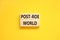 Roe vs Wade post-Roe world symbol. Concept words Post-Roe world on wooden blocks on a beautiful yellow table yellow background.