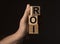 ROI acronym, return of investment word on cubes