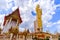 Roi Et, Thailand -February 14,2022 : A Big Buddha statue standing as Phra Phuttha Rattanamongkhon Mahamuni located in Wat Burapha