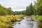 Roklansky brook near the village Modrava in Sumava National Park in early autumn. Czechia, Europe