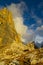 Roky cliff mountains of Dolomites yellow color at sunset