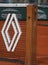 Roland Garros tennis net with premium sponsor`s Renault French multinational automobile manufacturer logo as seen during match