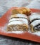 Roll cake with poppy seeds, walnut and cheese