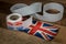 Roll of I Voted Today paper stickers on table with UK Flag