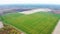 Roll lawn farm aerial view. Growing lawn field for sale. Birds eye view