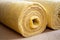 Roll of mineral wool filling used as isolation material in walls