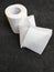 Roll of perforated white toilet paper