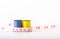 Roll sewing thread colors include yellow, blue and line measurements on a white background