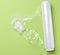 Roll of transparent cling film for packaging products, green background