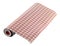 Roll of wallpaper on white background. Wallpaper pattern is red