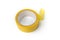 Roll of yellow masking tape on white background