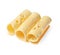 Rolled cheese pieces. White isolated background. Side view from above