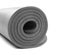 Rolled grey yoga mat