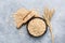 Rolled oats or oat flakes in bowl top view