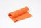 Rolled orange napkin