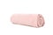 Rolled pink towel isolated on white background