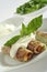 Rolled pore\'s leaves with cream and basil