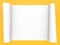 Rolled roll of white paper on a yellow background.