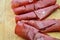 Rolled slices of bresaola, delicious typical italian raw beef salami, close up