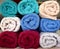 Rolled soft terry towels in various colors