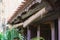 Rolled up bamboo window blinds. Traditional Vietnamese house detail