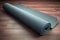 Rolled yoga pilates rubber mat inside gym studio on wooden floor AI generated