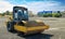 Roller compactor machine flattens the asphalt