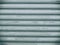 Roller shutter door background. Slide door texture. Rolling steel door texture.