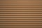 Roller shutter gate. Metal roller garage door as background. Automatic electric roll-up garage gate. Garage with brown rolling