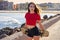 Roller Skate girl in a beach dock with red