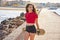 Roller Skate girl in a beach dock with red