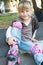 Roller skater - child girl - in protective equipment si