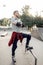 Roller skating, young skater poses in skate park