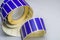 Roller tape blue self-adhesive label. Material for printing and marking products. Thermal label. Selective focus, copy
