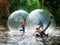 Roller Water Balls, fun for children during the King`s Day, formerly Queen`s Day, Amsterdam, Holland, the Netherlands