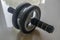 Roller wheel exercise tool for body core strength