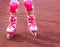 Rollerblades inline skates of a child closeup in action outdoors