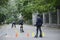 Rollerblading.Boys practicing in artistic slalom in a park