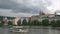 Rolling clouds over Prague castle and Vltava river