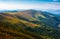 Rolling hill of mountain ridge in late summer