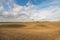 Rolling hills and ploughed fields